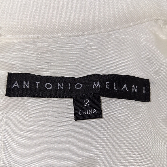 An Antonio Melani sleeveless v-neck split hem lined midi dress in a size 2. - Picture 6 of 9